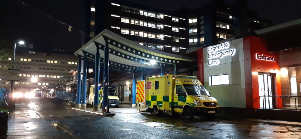 An ambulance outside urgent and emergency care.