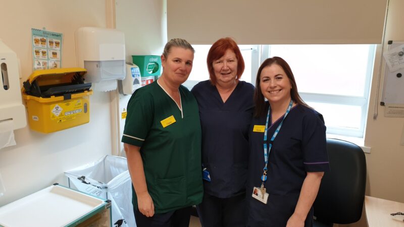 Cervical screening team with patient