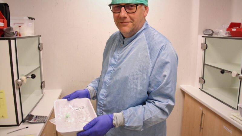 Bill Wetherill creating chemotherapy drugs in pharmacy