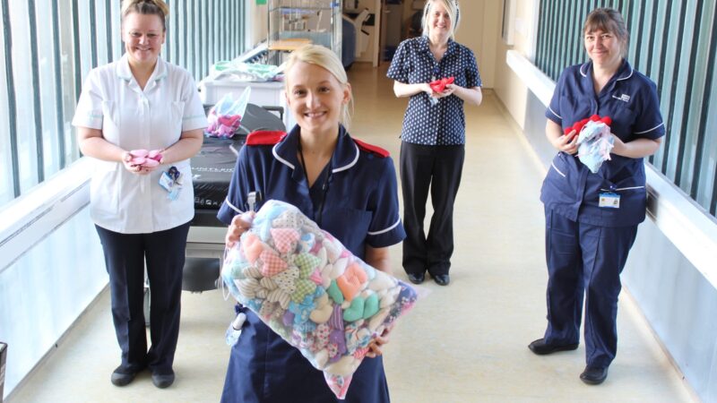 Critical care team with their knitted hearts