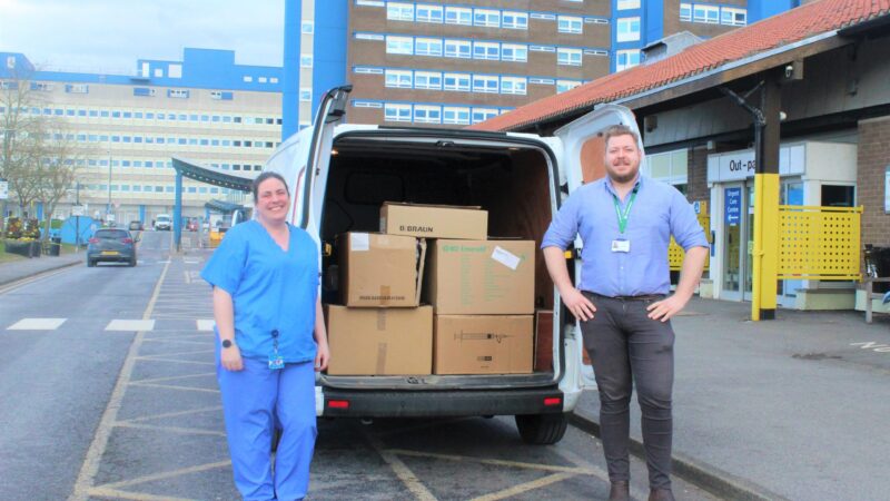 Vladyslav Vovk with a van of supplies outside the University Hospital of North Tees.