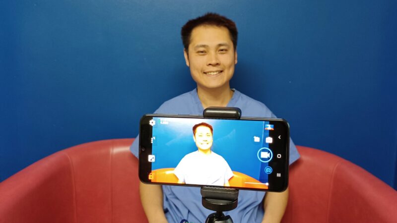 Leung Yu Wu in front of a camera recording his appeal.