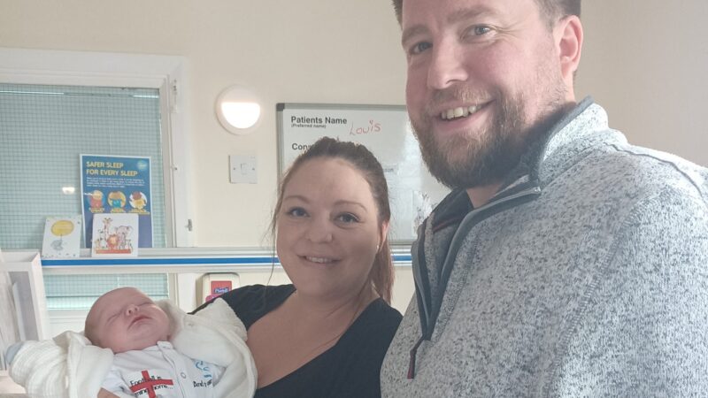 Mum Leanne and dad Ryan. Leanne holds baby Louis.