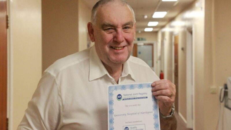 Chris Tulloch holding the NJR certificate.