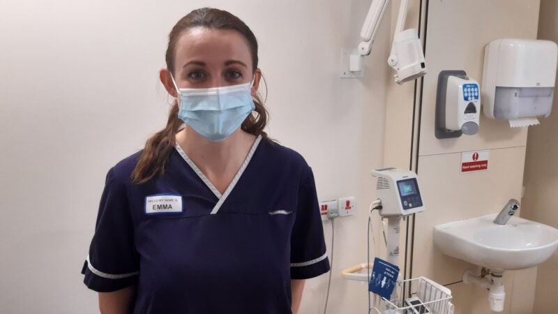 Emma Francis. She is wearing a face mask.