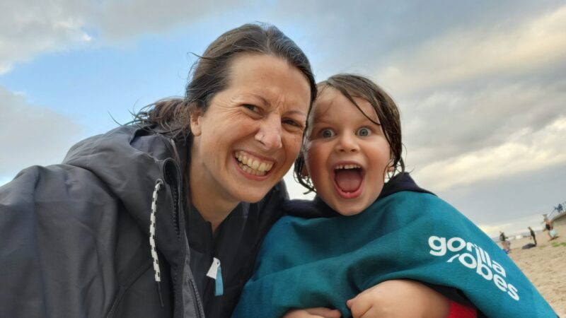 Lottie and her son Rudy on the beach.
